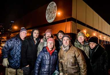 Their rage in lights! Activists illuminate building to protest city’s broken park promise