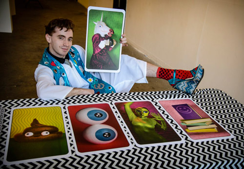 Weird of fortune! Artist creates tarot cards featuring smiling poop