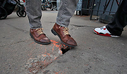 Hole in one! Beford Ave. sidewalk a walker’s nightmare