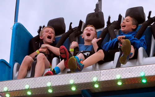 Thrill-seekers spin, drop, and fly at Kings County Fair