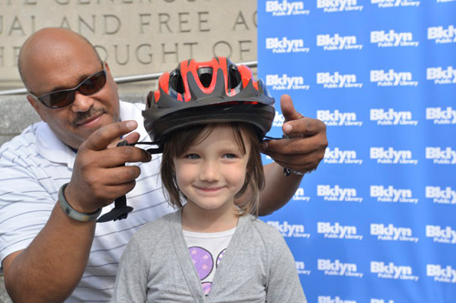 On your head and on the house: Library giving away free helmets
