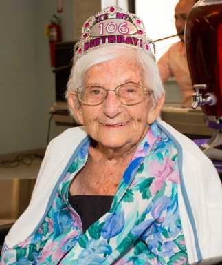 Raising a glass of champagne for Tillie Fienberg