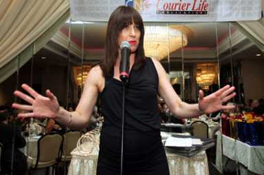 Comic and NPR host Ophira Eisenberg is a riot act at our Women of Distinction awards night
