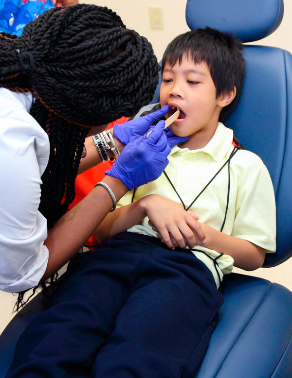 Standing O is helping to snip the ribbons on new facility