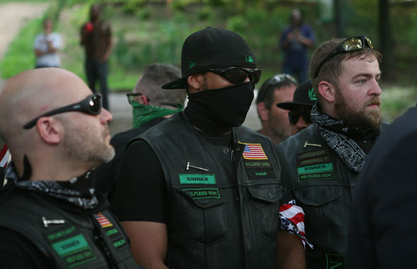 Dozens congregate in Fort Greene Park to celebrate, burn Old Glory