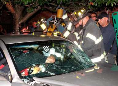 Firefighters cut open cars to rescue crash victims