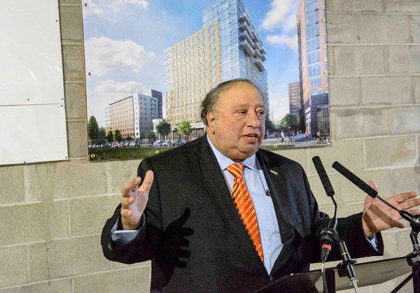 Top in the name of love: Developer caps off building named for wife