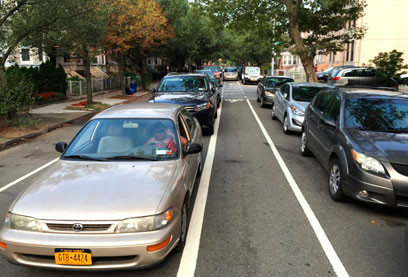 Fine line! Residents say bike lane led to alternate-side tickets