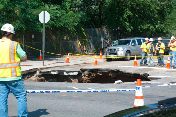 Hole-y moly! Sinkhole swallows Sunset Park intersection