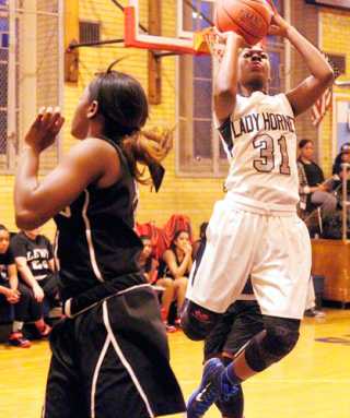 Big effort from Moore not enough for Midwood