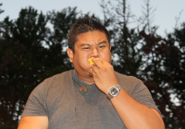 Jamaican me hungry! Eaters chow down in Caribbean patty-eating contest
