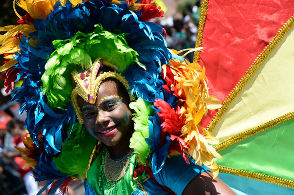 Revelers shake their tail feathers at West Indian Day Parade