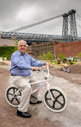 New, temporary park with bike track, small farm, and yoga classes opens at Domino site