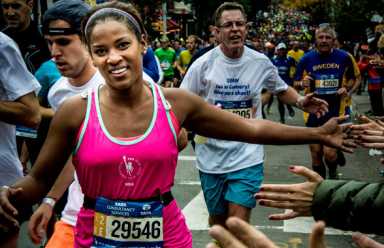 The race card-board: Brooklynites support marathoners with signs on the sidelines