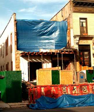 Full frontal: Facade-less Ridge building offers view into illegally converted home