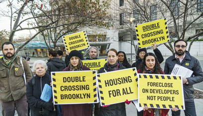 War paint: Artists protest real-estate conference at Brooklyn Museum