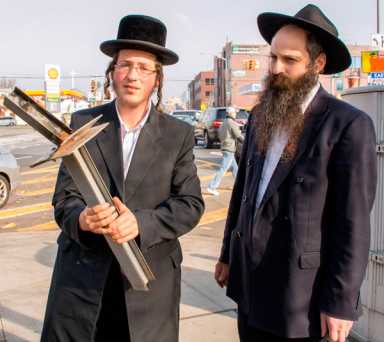 Flicker of hope: Ridge menorah remains lit after vandals strike