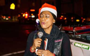 Crown Heights residents sing carols at gun violence hot spots
