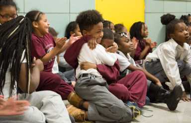 Bed-Stuy kids flip out when Nets star surprises them with Xmas gifts