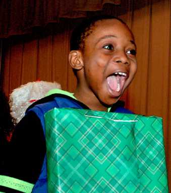 Santa brings toys to Flatbush school