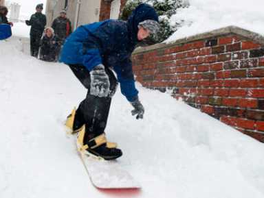 Cowabunga! Brooklynites snowboard, ski, and sled through blizzard