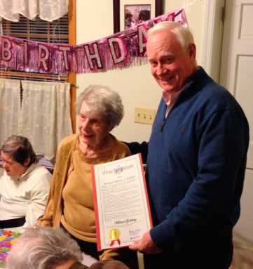Standing O is helping Mildred blow out the candles