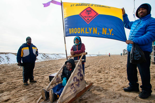Mush it to the limit! Scouts compete in Coney Island sled race