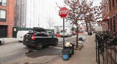 Cars keep blowing this stop sign in the middle of a Gowanus block