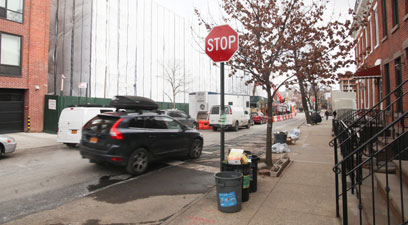 Cars keep blowing this stop sign in the middle of a Gowanus block