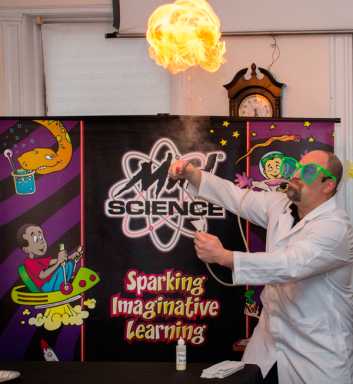 Sciene and religion get along at Ridge Purim party