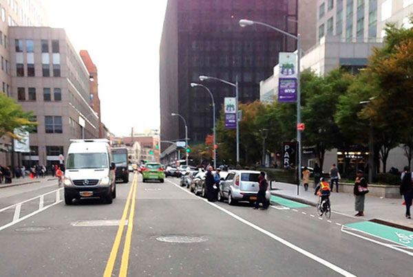 Great barrier relief! City unveils parking-protected bike lanes for Jay St.