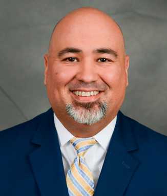 Standing O welcomes the new coach