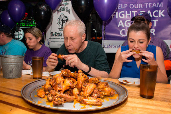 Wing-ding! Brooklyn team nets most $$$ in chicken-eating fund-raiser