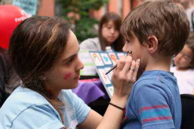 A good turn! Kids take Cobble Hill street-fair carousel for a whirl