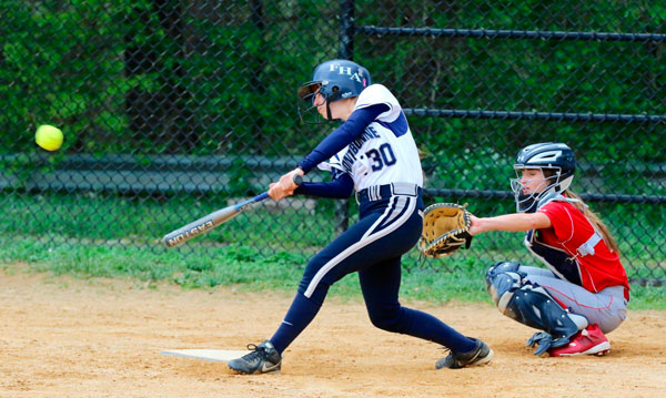 Terriers out-slug Fontbonne with first place on the line