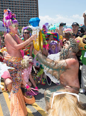 Shock-rocker pops question to burlesque queen at Mermaid Parade
