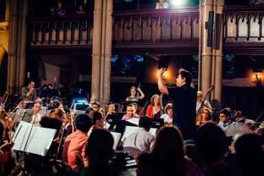 Wages of sing: Volunteer orchestra performs devilish opera