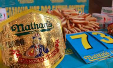 Joey Chestnut regains hot-dog title with record-breaking 70 franks!