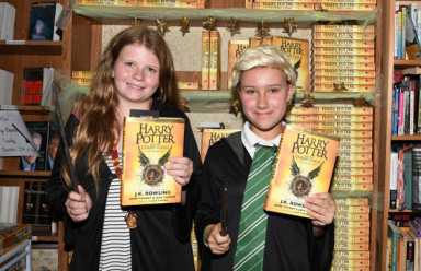Magic words: Wizards appear for ‘Potter’ release parties