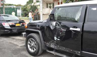 Two cars, garbage truck collide on Bay Parkway