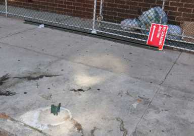 A bad sign? Someone keeps cutting ‘no standing’ sign in front of school