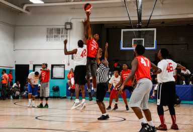 Beat the heat! Red Hook police, kids play basketball tourney