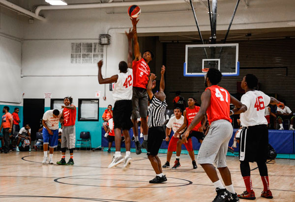 Beat the heat! Red Hook police, kids play basketball tourney