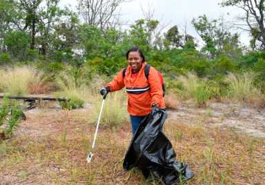Plumb job: Vols clean up fetid beach