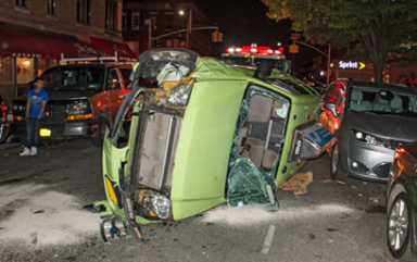 See it: Cab rolls over in Bensonhurst