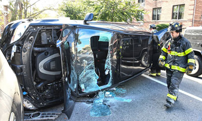 See it: Driver flips car in Sunset Park