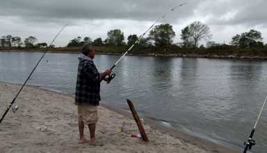 Casting no doubts: Fishermen fine with poop-filled creek