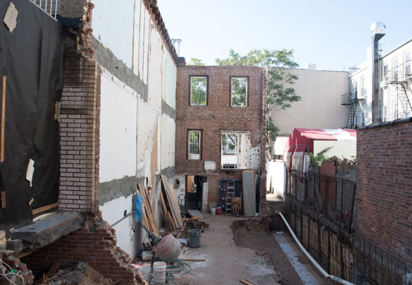 Busted! Workers caught demolishing 83rd Street home with no permit