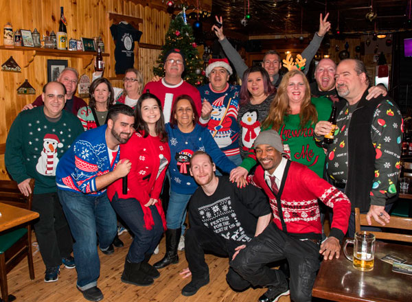 Fleece navidad! Ridgites show off ugly sweaters at Schnitzel Haus shindig