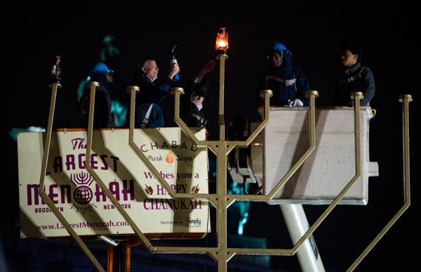 Park Slope’s giant mayor lights Park Slope’s giant menorah